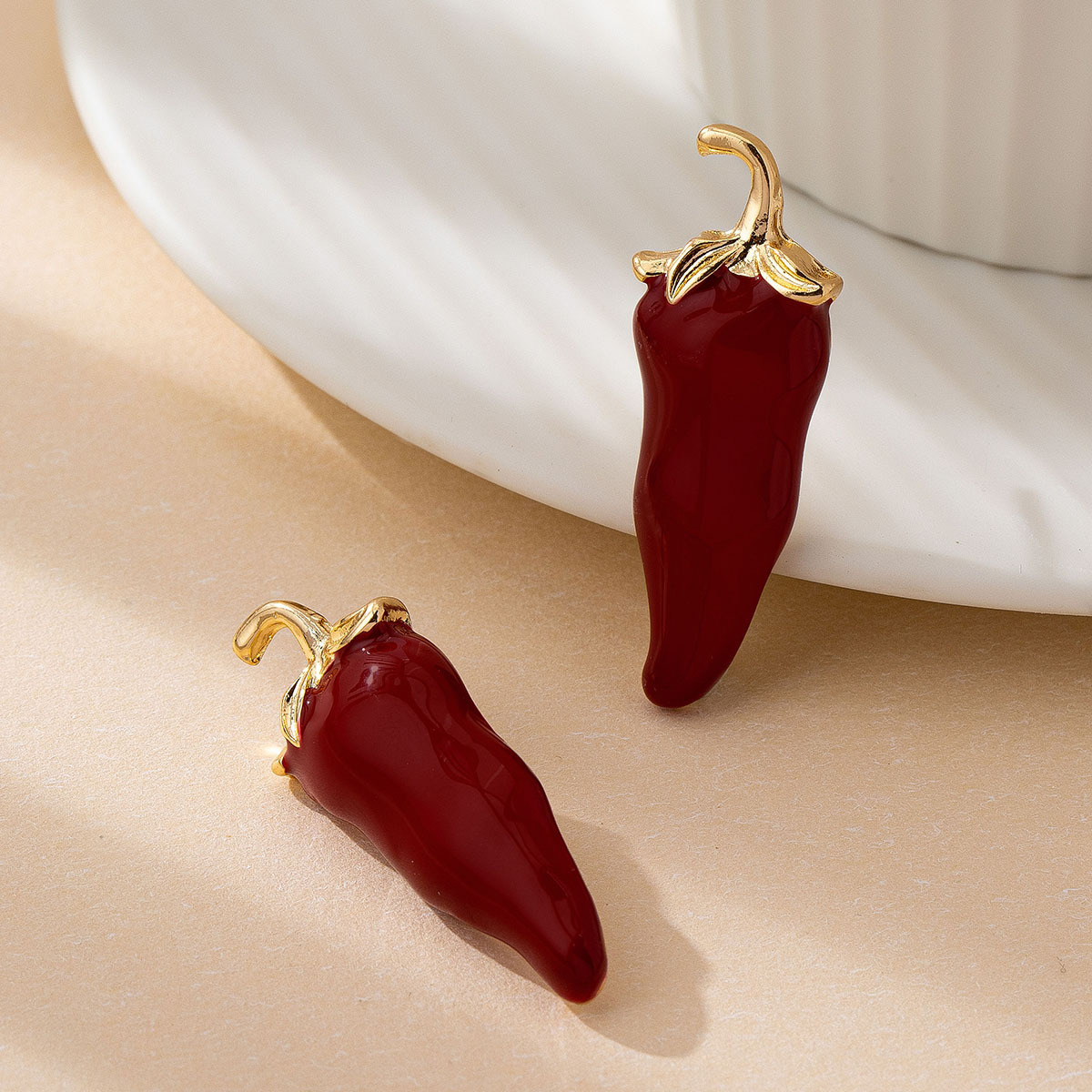 Eigenzinnige Chili Stud Oorbel - Quirky Vintage Fashion recensie en prijs